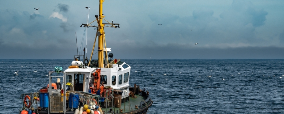 Commercial Fishing Trawler On The Calm Water Of The Atlantic Ocean In Scotland, UK. Photo credit: Shutterstock.