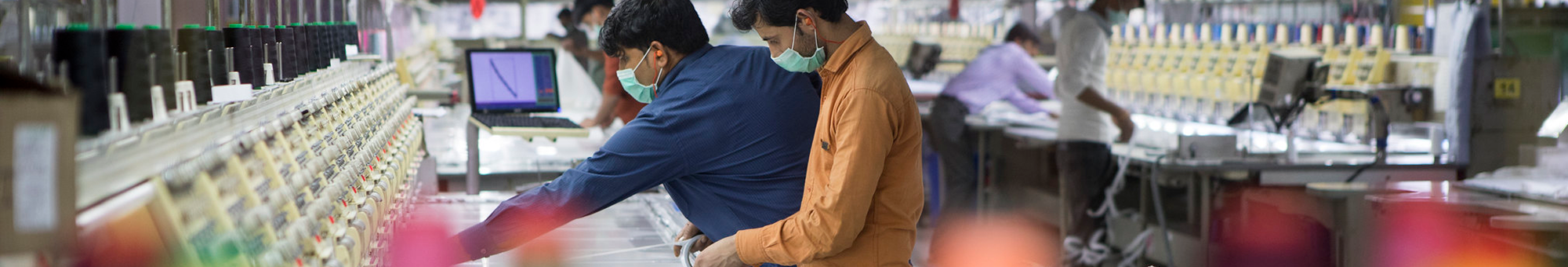 Male garment factory workers, India
