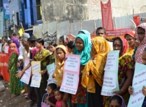 Women demonstrate at the collapsed Rana Plaza site, Bangladesh